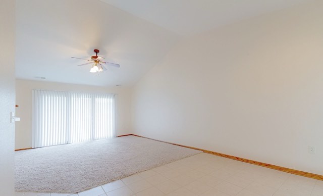 Living room with vaulted ceiling
