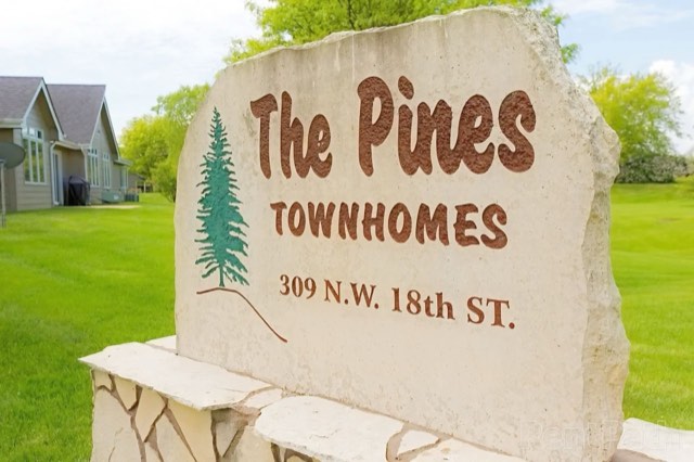 The Pines Townhomes stone monument sign